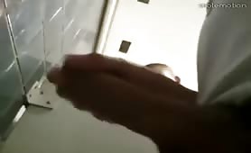 Caught big cock jerking off in a public restroom