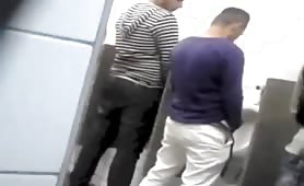 Spying on guys masturbating in public toilets