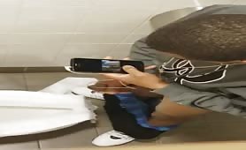 Spying a young black guy masturbating in a public toilet