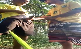 Two young Brazilians guys masturbate outdoors after a game